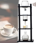 Badass Cold Brew Coffee Maker With 1000ml Ice Reservoir And Adjustable Dripper System, black wood frame with glass carafe.