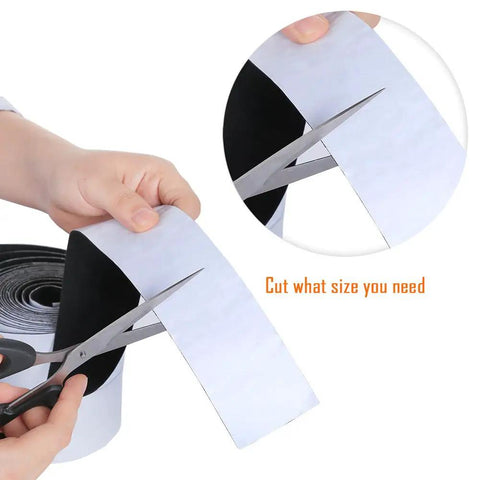 Self Adhesive Polyester Felt Tape 1.96 Inch Wide By 0.04 Inch Thick And 14.7 Feet Long Black being cut with scissors