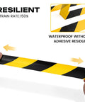 Built Tough Industrial Caution Tape For Warehouse Floors That Crush Resists Forklifts And Waterproof Construction While Delivering Long Haul Safety Strips For Factories And Parking Lots Daily, showing black and yellow striped tape in use.