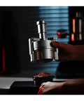 Hit Your Sweet Spot With This Heavy Duty Wdt Needle Distributor Engineered For 58mm Espresso Portafilters To Crush Stubborn Clumps And Elevate Your Roast Game, silver WDT tool over espresso grounds.
