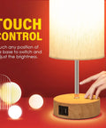 Bedside Lamp With USB A And USB C Charging Ports And AC Outlet, Touch Control 3 Way Dimmable Table Lamp with hand adjusting it