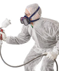 Person wearing Elipse Low Profile Respirator Mask With Filters For Dust And Organic Gases And Vapors Lightweight Comfort Fit M/L while painting