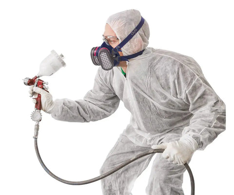 Person wearing Elipse Low Profile Respirator Mask With Filters For Dust And Organic Gases And Vapors Lightweight Comfort Fit M/L while painting
