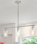 Three Light Kitchen Island Pendant In Brushed Nickel With Glass Shade, 31 Inch Modern Linear Chandelier in kitchen setting