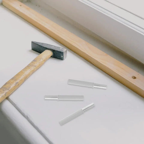 Smooth As Butter Soft Close Dampers For Trash Cans And Cabinet Doors 6 Pack Hydraulic Buffer Bumpers and hammer on work surface.