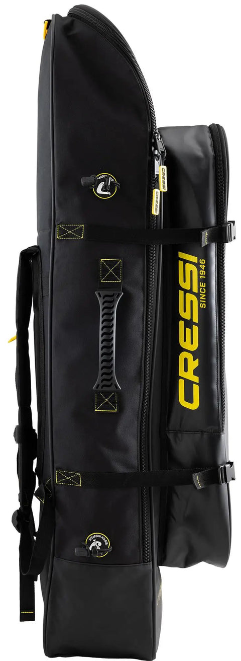 Side view of Piovra Dry Dry Backpack For Freediving And Spearfishing Gear With Water-Repellent Material, 90 L Capacity, Black And Yellow.