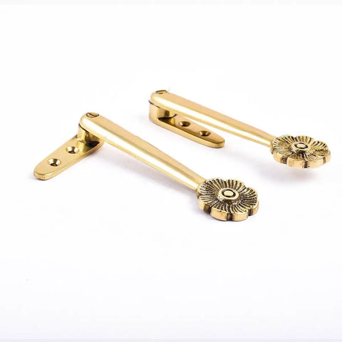 5 inch brass floral stair carpet holder clips, part of a pack of 13 solid brass tarnish-resistant rug fasteners with non-slip grip