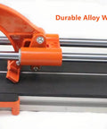 Close-up of tungsten wheel and dual rails on 24 Inch Manual Tile Cutter With Double Rails For Ceramic And Porcelain Tiles Beast Mode Stability Anti Skid Feet Adjustable Ruler Precise Cuts And Easy Setup Hand Tool