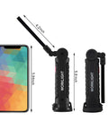 Size comparison of rechargeable LED work light with magnetic base and hanging hook alongside smartphone for scale.