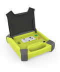 AED trainer with lime-yellow body, gray corner guards, lid open, displaying control panel and instruction diagram