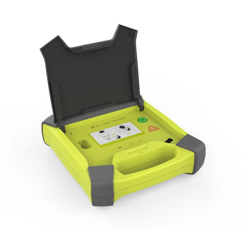 AED trainer with lime-yellow body, gray corner guards, lid open, displaying control panel and instruction diagram