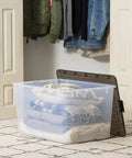 Big Ticket Clear Storage Bins 144 Quart 3 Pack Stackable Containers With Snappy Buckles Grooved Lid Handles Every Heavy Haul For Zero Drama Household Organization with stacked blankets and pillows.