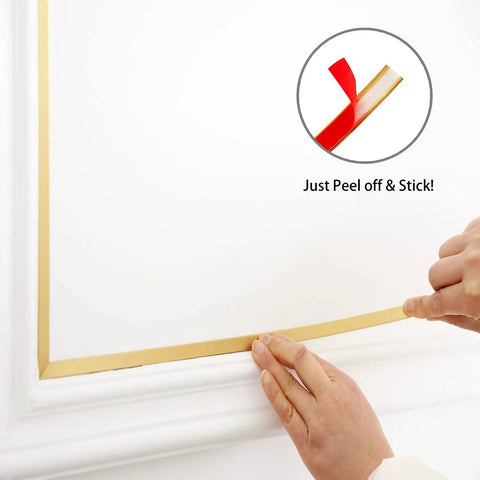 Applying Matte Gold Peel And Stick Molding Trim on wall; shows easy self-adhesive application with flexible trim edge.