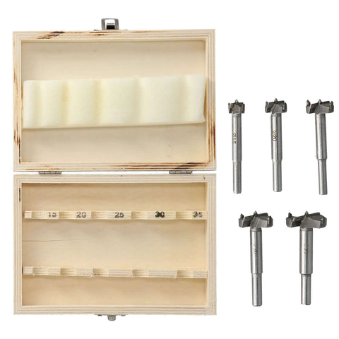 Front view of a five-piece hinge jig drill bit set with adjustable positioning beside a two-compartment wooden storage box.