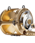 Heavy Duty Deep Sea Tuna Reel For Offshore Trolling With Two Speed Gear Ratio Two Point Five To One And One Point Three To One 132Lb Max Drag Saltwater Big Game Reel Right Handed, side view, gold color