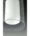 Close-up of Double Glass Pendant Light With Oversized Seeded Glass And Inner Etched White Shade One Light Polished Chrome Finish