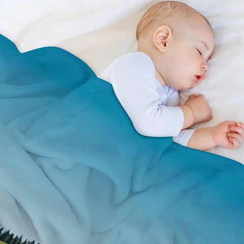 Baby sleeping under Milk Farm Flannel Throw Blanket 55x70 Inch Cozy Soft Lightweight Plush For Couch Bed Sofa Oversized