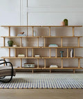 Retro Style Floor Standing Book Shelf With Open Multi Layer Shelves For Living Room Or Office, Wall Mount Option, showing wooden design.