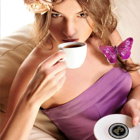 Woman in purple dress holding coffee cup and saucer with pod from Bold Dark Roast Coffee Pods Variety Pack 40 Count For Keurig K Cup Machines Single Serve Cups World Roasts French Roast Espresso Roast Italian Roast Rich Flavor.