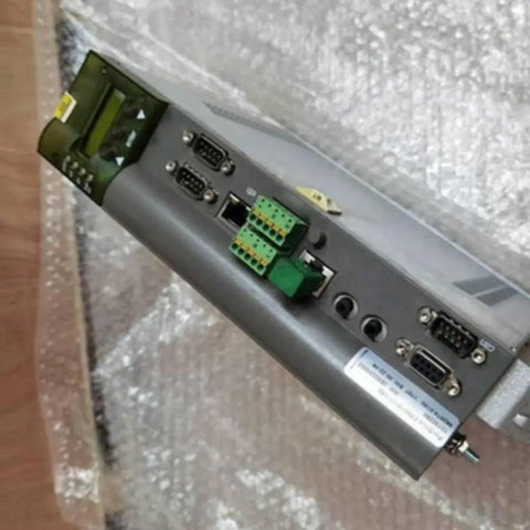 Beefed Up Servo Drive For Industrial Automation With Precise Torque And Speed Control, Smooth Motion, And Flexible Connectivity For Easy System Integration In Heavy Machinery And Manufacturing Lines, metal housing with ports