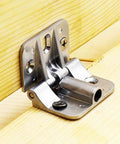 Two zinc alloy cabinet door hinges installed on wood, 180-degree adjustable with torque control