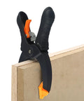Ratcheting Hand Clamps Set With Quick Release Grip, 6 Inch And 8 Inch Jaw Openings, Heavy Duty Clamps For Woodworking And Carpentry, Pro Grade Build For Studio And Shop Projects, Strong Secure Grip, Easy One Hand Operation, Black And Orange clamping a wood panel