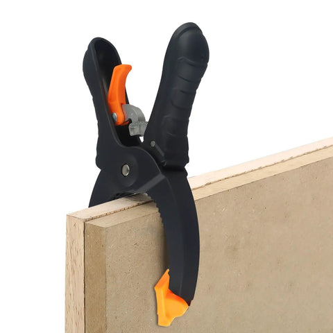 Ratcheting Hand Clamps Set With Quick Release Grip, 6 Inch And 8 Inch Jaw Openings, Heavy Duty Clamps For Woodworking And Carpentry, Pro Grade Build For Studio And Shop Projects, Strong Secure Grip, Easy One Hand Operation, Black And Orange clamping a wood panel