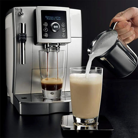 Fully Automatic One Touch Coffee Maker Bean To Cup Espresso Machine For Home Office Adjustable Silent Grinder Detachable Tank Super Easy Cleanup Nails Your Daily Grind in action pouring milk into a glass.