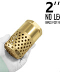 Gloved hand holding 2 Inch Brass Foot Valve With Mesh Strainer And Backflow Prevention, Universal One Way Female NPT Check Valve For Irrigation