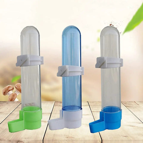 Auto Bird Feeder And Water Dispenser With Clear Polymer Reservoir Clip On Cage Rack Gravity System For Budgies Cockatiels And Parakeets No Sweat Setup Keeps Em Good Daily in green, blue, and clear versions