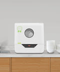 Slick Compact Countertop Dishwasher With Four Fast Wash Cycles And Chill Noise Level To Blast Dirty Dishes For Household Crews And Small Apartment Sets on kitchen counter.