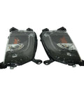 High Grade Pair Driving Fog Lights Boasting Hella Bright Glow And Snazzy Clear Lens Built To Drop Right Into Tesla Model S 2012 To 2020 US Spec Front Bumper Upgrade Kit - close-up angle
