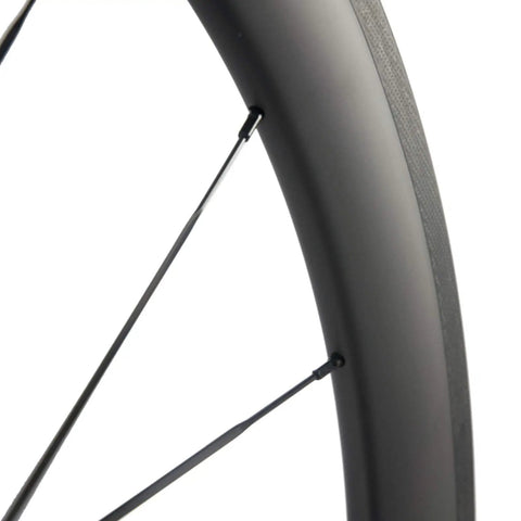 Close-up of Ride Ready Carbon Road Wheelset 38 50 60 88mm U Shape 25mm Wide 700c Clincher UD Carbon Shimano spokes and rim detail.