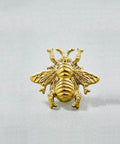 Golden bee cabinet knob showcasing intricate design, part of Elevate Your Vibe With These Charming Bee Cabinet Knobs Set Of 8.