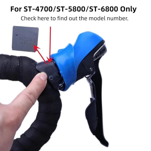 Close-up of bike brake lever with blue Silicone Hood Covers for Bike Brake Levers And Shifters, compatible with Shimano 105 models.