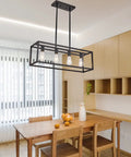 Farmhouse Rectangle Chandelier For Dining Room And Kitchen Island, Modern Linear Hanging Light Fixture, Matte Black 4 Light Industrial Pendant Lighting With Adjustable Rods For Custom Height And Easy Install above wooden table in kitchen