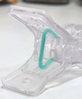 Close-up of a Premium Ten Pack Of Heavy Duty Spring Clips Measuring 3.5 Inches Featuring Transparent Plastic build.