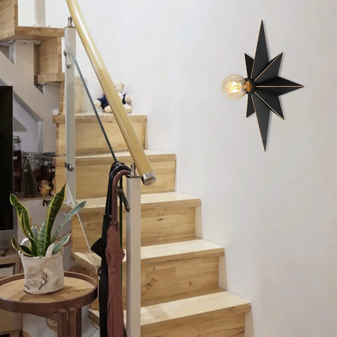 16 Inch Industrial Black Metal Star Flush Mount Ceiling Light With Vintage Farmhouse Vibe installed in a modern hallway setting.
