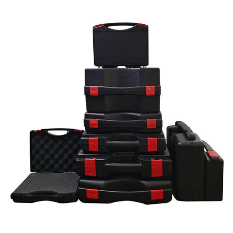 Stack of black rugged plastic tool boxes with cushioned sponge inserts, various sizes, portable organizer for home and garage use.