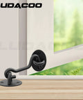 Bulletproof 3 Inch Hook And Eye Gate Latch Straight Up Heavy Duty Barn Door Lock on a door frame with a black finish.