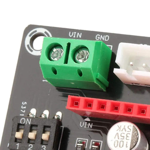 Close-up of the Beefed Up 42 Stepper Motor Driver Expansion Board showing terminal power connector and DIP switch for 3D printers.