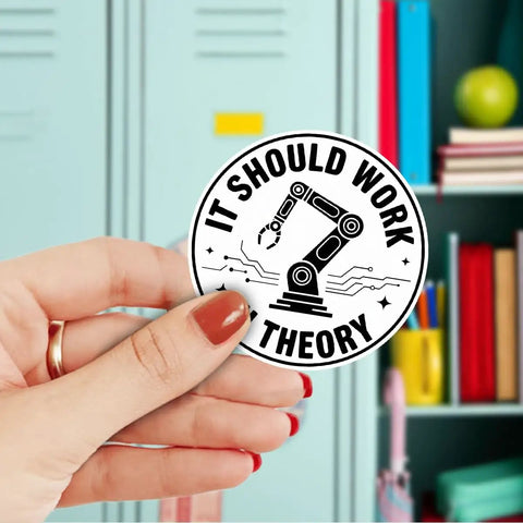 Person holding sticker from Three Pack It Should Work In Theory Stickers Set Funny Engineering Robot Arm Theme For Mechanical Engineers