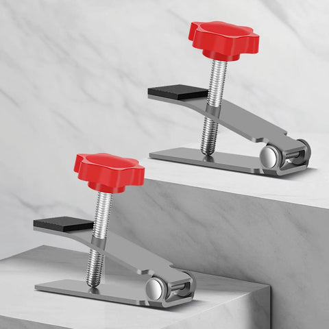 Heavy Duty Tile Lifter With Adjustable Arm Jack And Triangular Load Bearing Base Plus Hassle Free Fine Tune Knobs showing red knobs and steel construction.