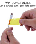 Person wrapping damaged data cable with High Temperature Polyimide Tape For PCB And CPU Protection, 1 Mil Kapton Style Heat Shield