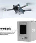 Two Way Drone Battery Charging Hub With Smart Display and drone in flight showing power bank function