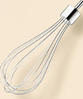 Cordless Electric Hand Mixer With Stainless Steel Beaters close-up of stainless steel whisk for mixing eggs and cream.