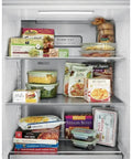 Various frozen meals and vegetables stored in a refrigerator, including boxed pizzas, pasta, and veggie dishes.