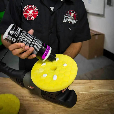 Quantum Best Of The Best Buffing And Polishing Pad Kit For Auto Detailing being used on a DA polisher with yellow pad