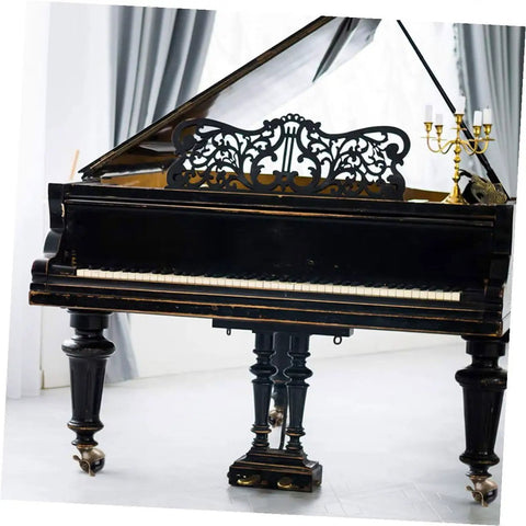 Vintage Brass Finish Plate Casters And 2 Inch Swivel Furniture Wheels Built Tough For Easy Room Refreshes on a black grand piano.