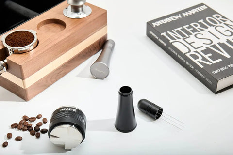 Espresso WDT Tool With 6 Precision Needles For Baristas, Distribution Stirrer, Pro Grade Kit components on a table with stand and book
